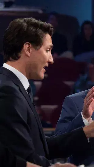 Canada PM Justin Trudeau dukes it out with Tory rival over climate, election timing