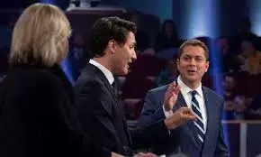 Canada PM Justin Trudeau dukes it out with Tory rival over climate, election timing